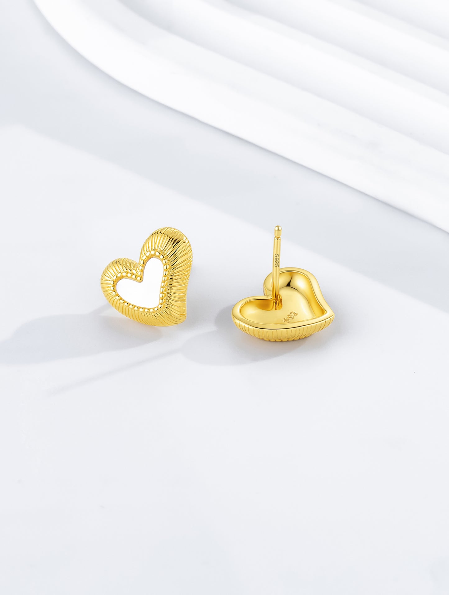 RADIANT LOVE HEART EARRINGS