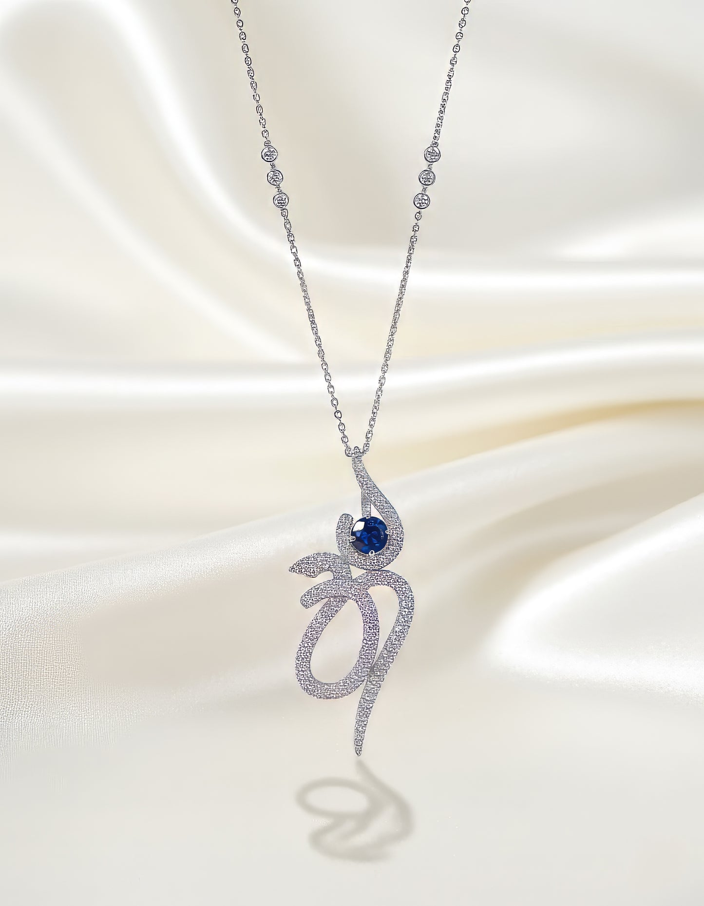PREMIUM BLUE OM SERENITY PENDANT