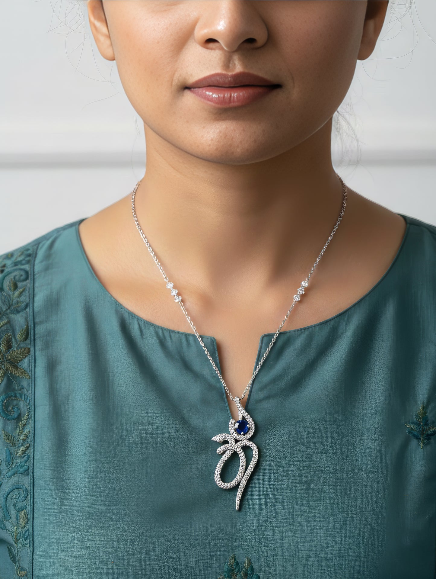 PREMIUM BLUE OM SERENITY PENDANT