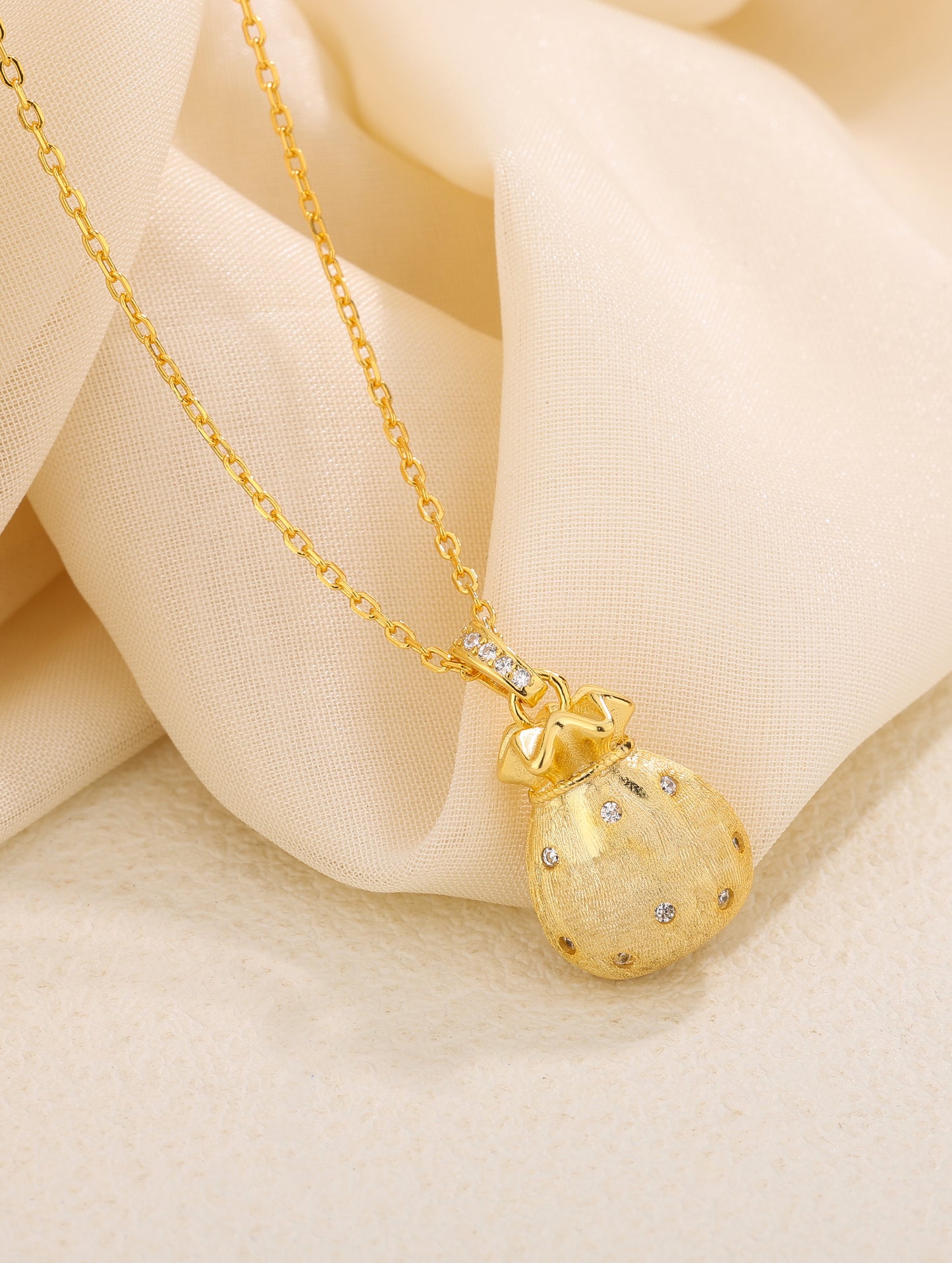 GOLDEN TREASURE POUCH CHARM CHAIN
