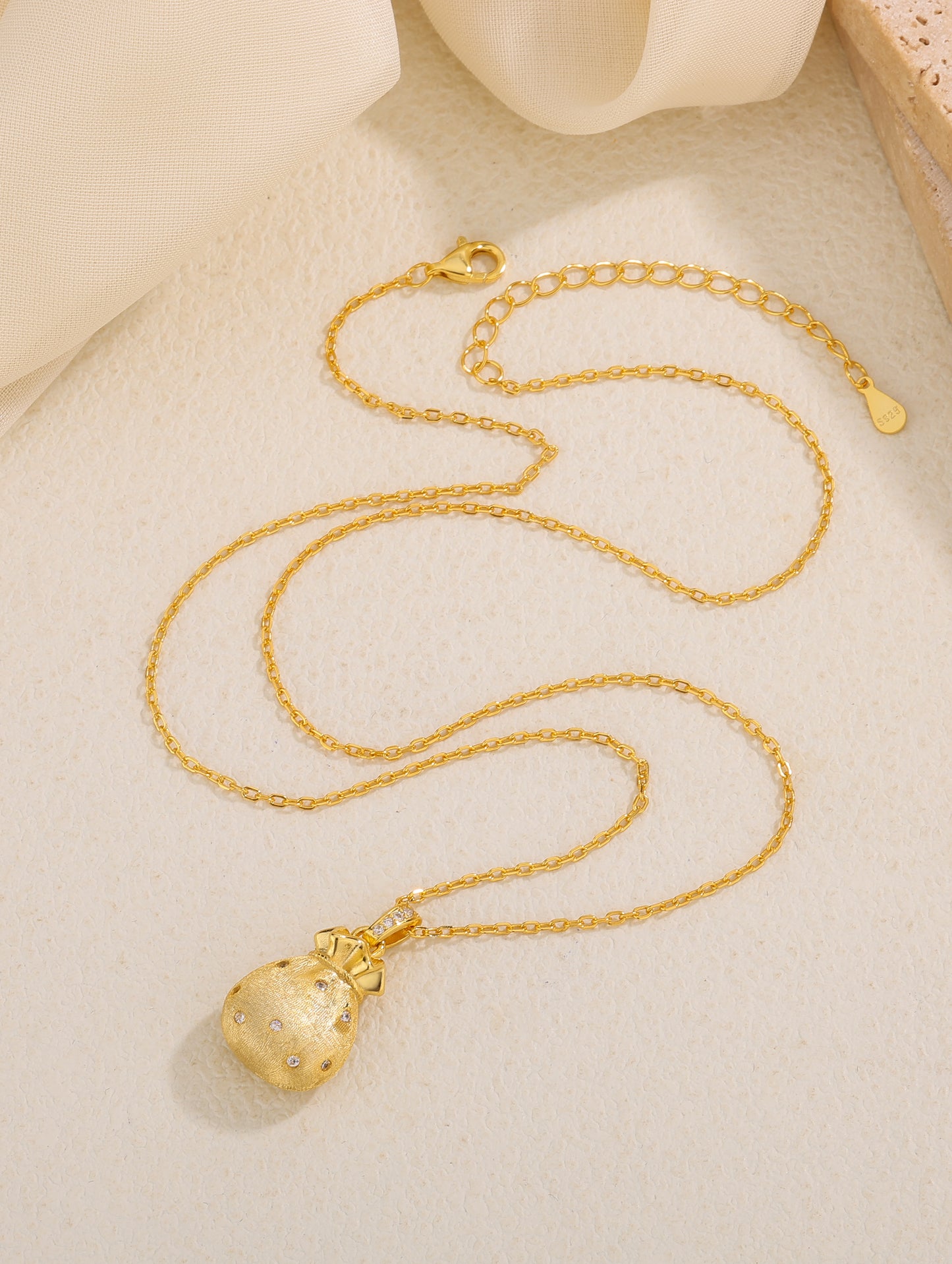 GOLDEN TREASURE POUCH CHARM CHAIN