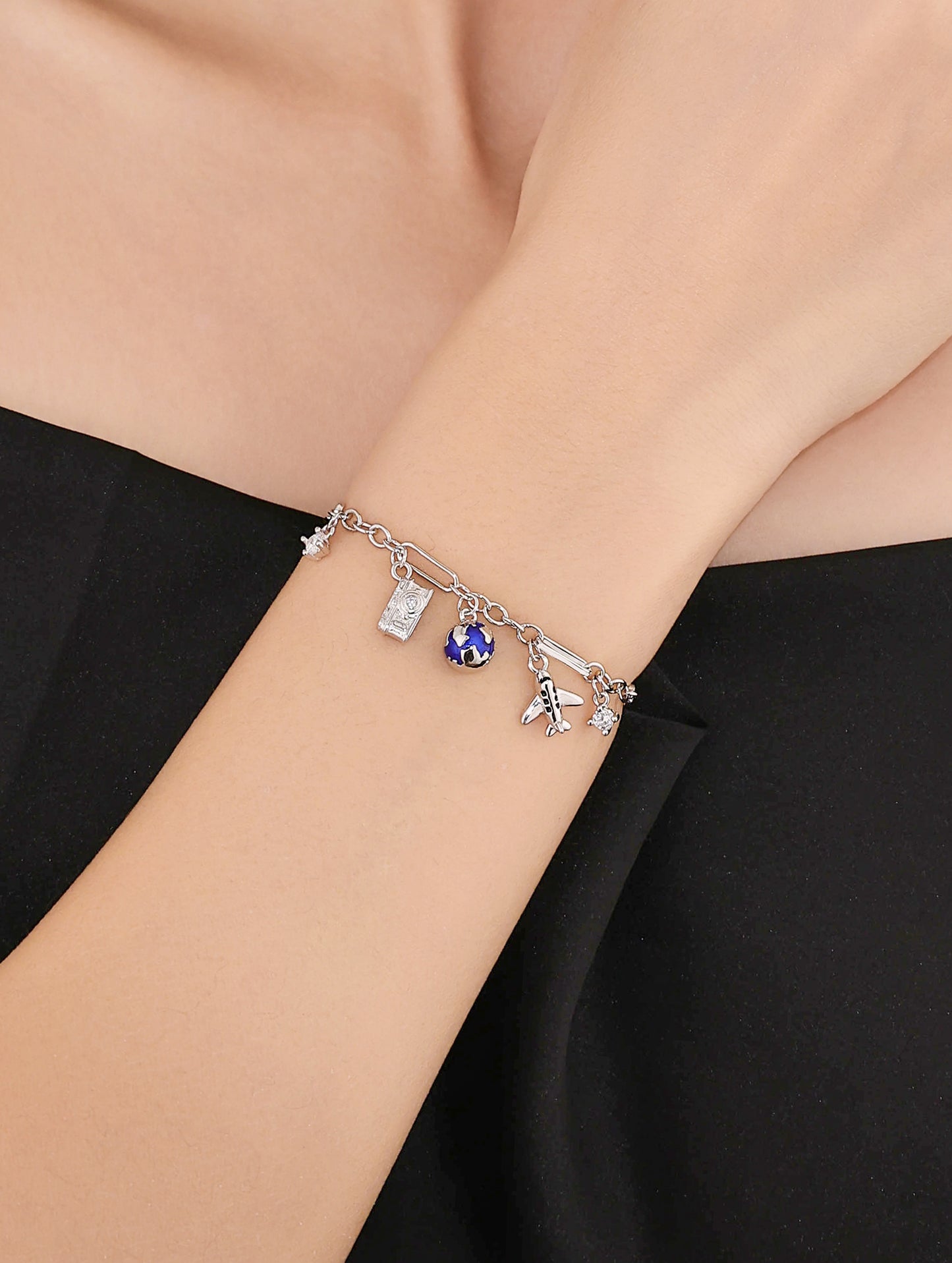 TRAVEL TALES CHARM BRACELET