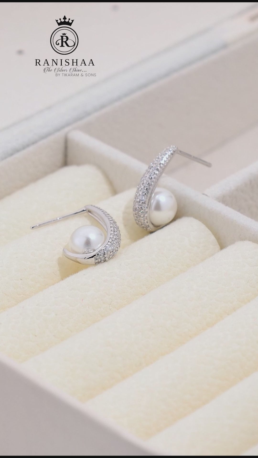 Load and play video in Gallery viewer, PEARL CRESCENT GLOW EARRINGS
