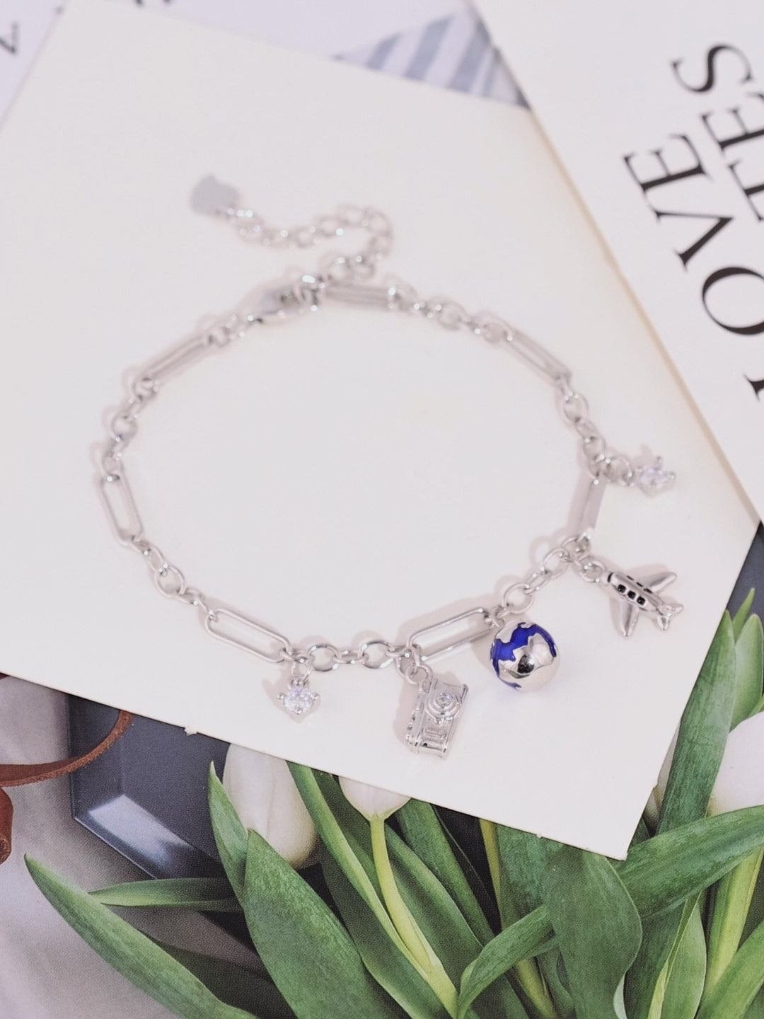 Load and play video in Gallery viewer, TRAVEL TALES CHARM BRACELET
