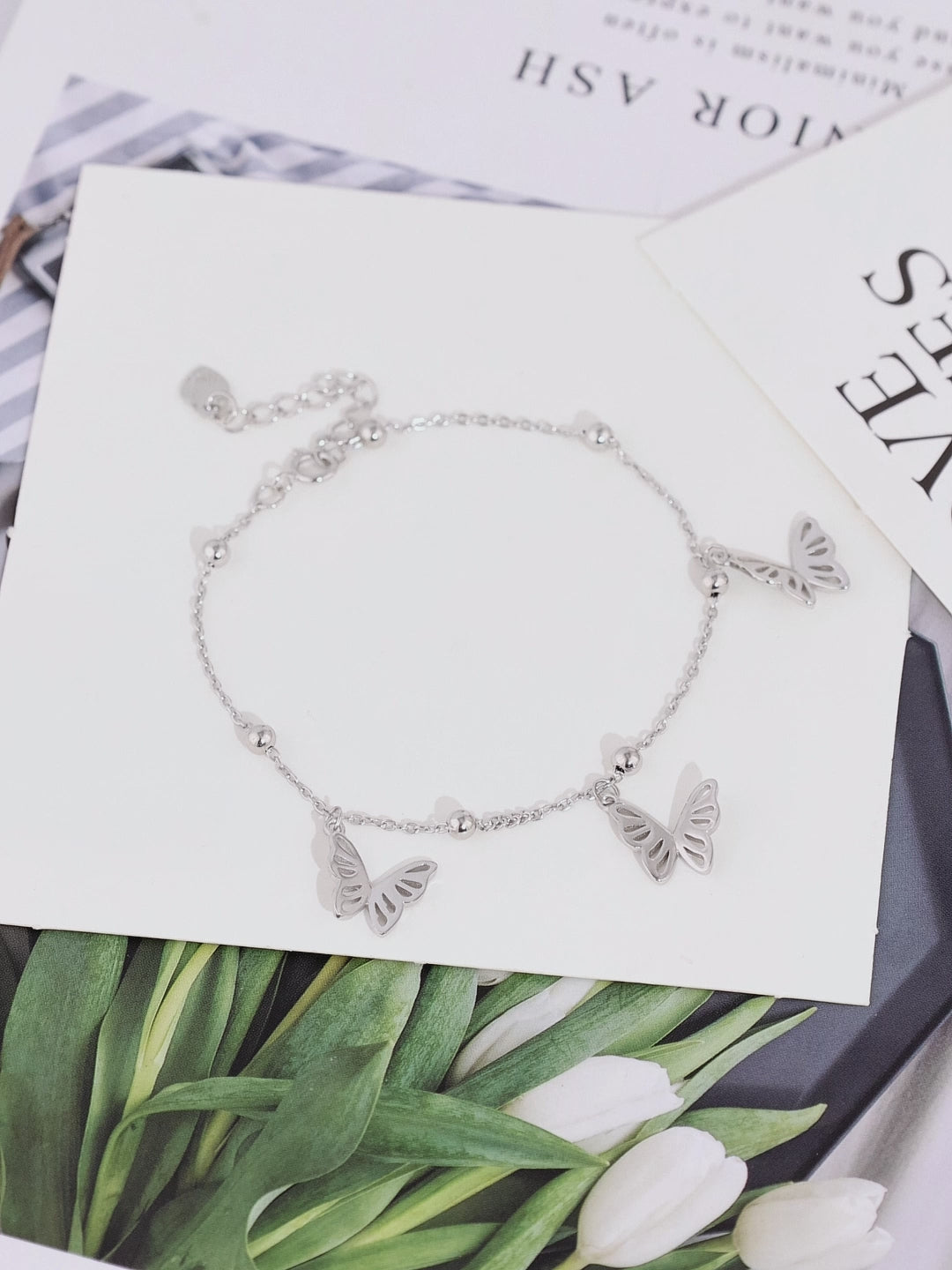 Load and play video in Gallery viewer, SILVER BUTTERFLY CHARM BRACELET
