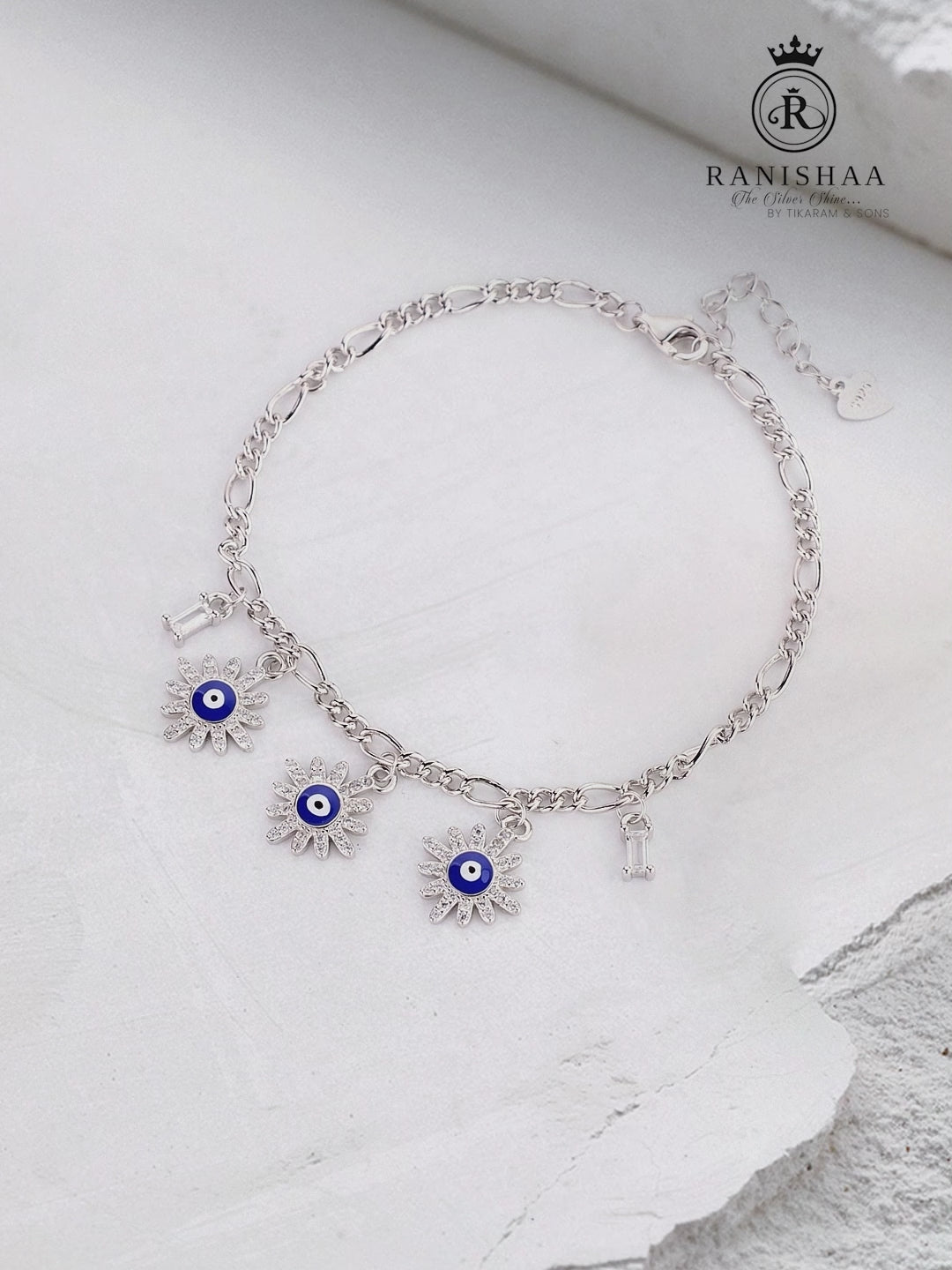Load and play video in Gallery viewer, FLORAL EVIL EYE SILVER BRACELET
