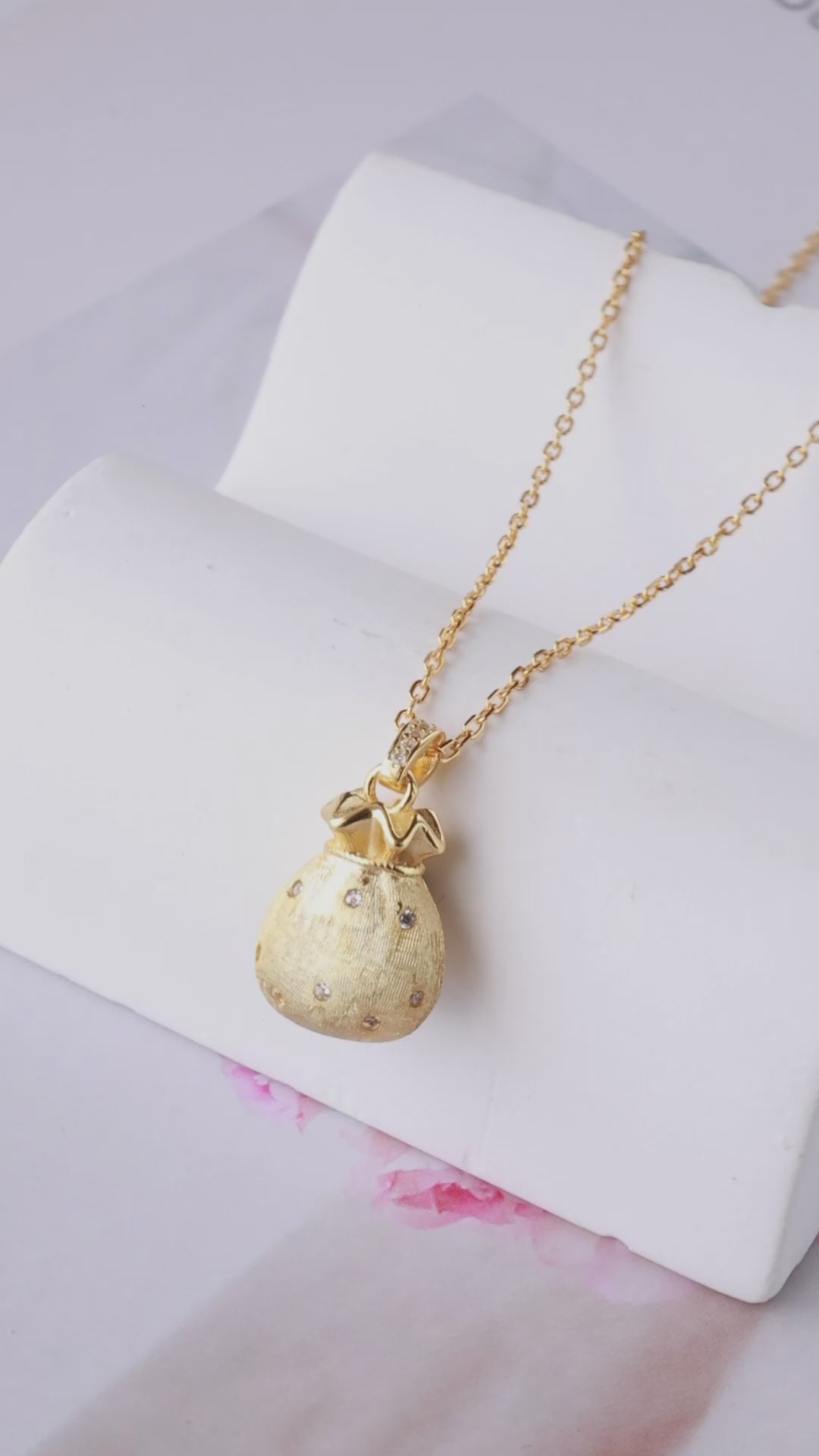 Load and play video in Gallery viewer, GOLDEN TREASURE POUCH CHARM CHAIN

